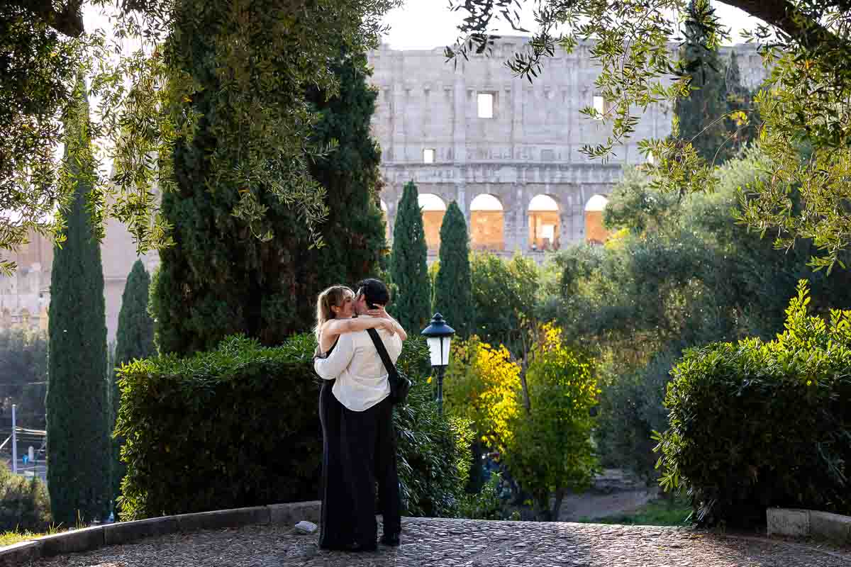 In love in Rome and just engaged. Colosseum photoshoot. Sunset or dusk images 
