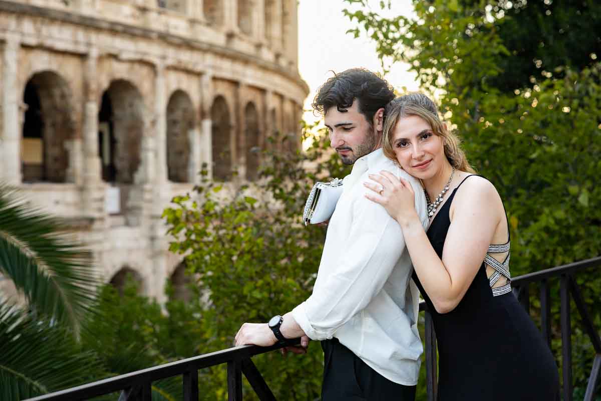 Unique posing set up while leaning on him as couple pictures are taken