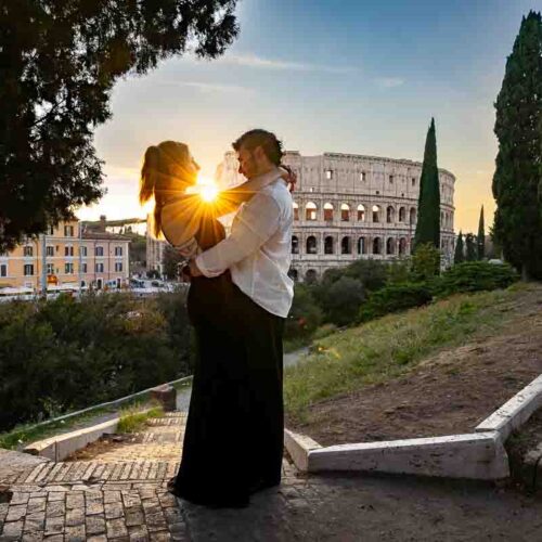 silhouette imagery at sunset in Rome during a proposal photoshoot at the roman Colosseum