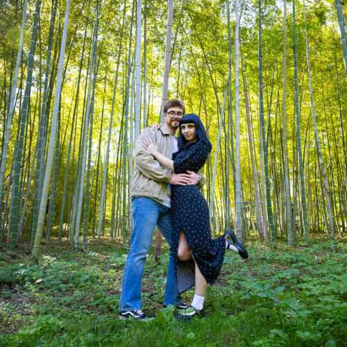 Couple photographer session in a bamboo forest found in the botanical park of the Rome city center in Italy
