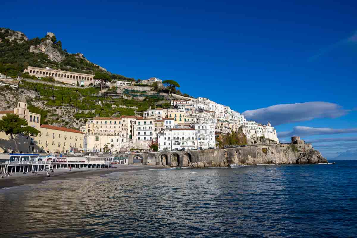 A picture perfect view of the Amalfi coast in the distance with sea in the forefront 