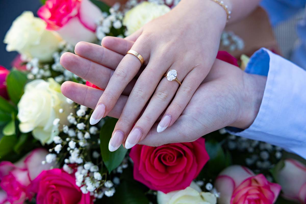Engagement ring close up image while wearing the beautiful ring on finger 