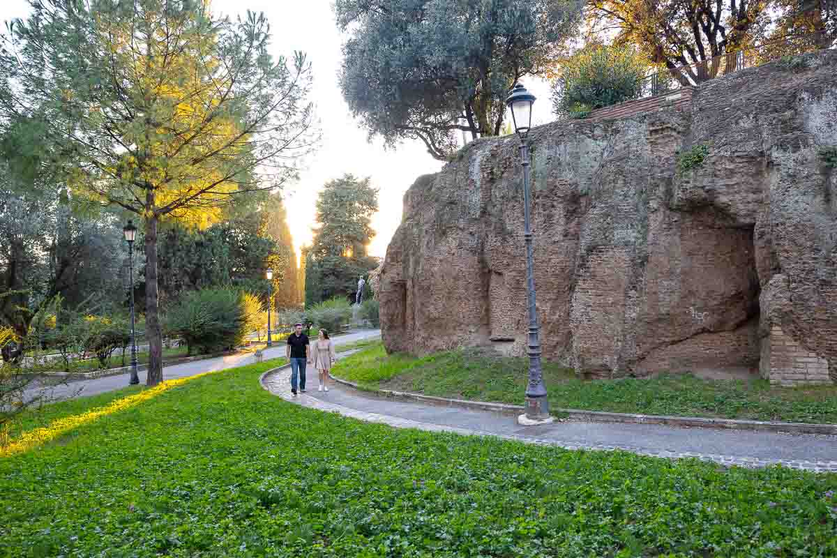 Walking together park during the engagement session photoshoot