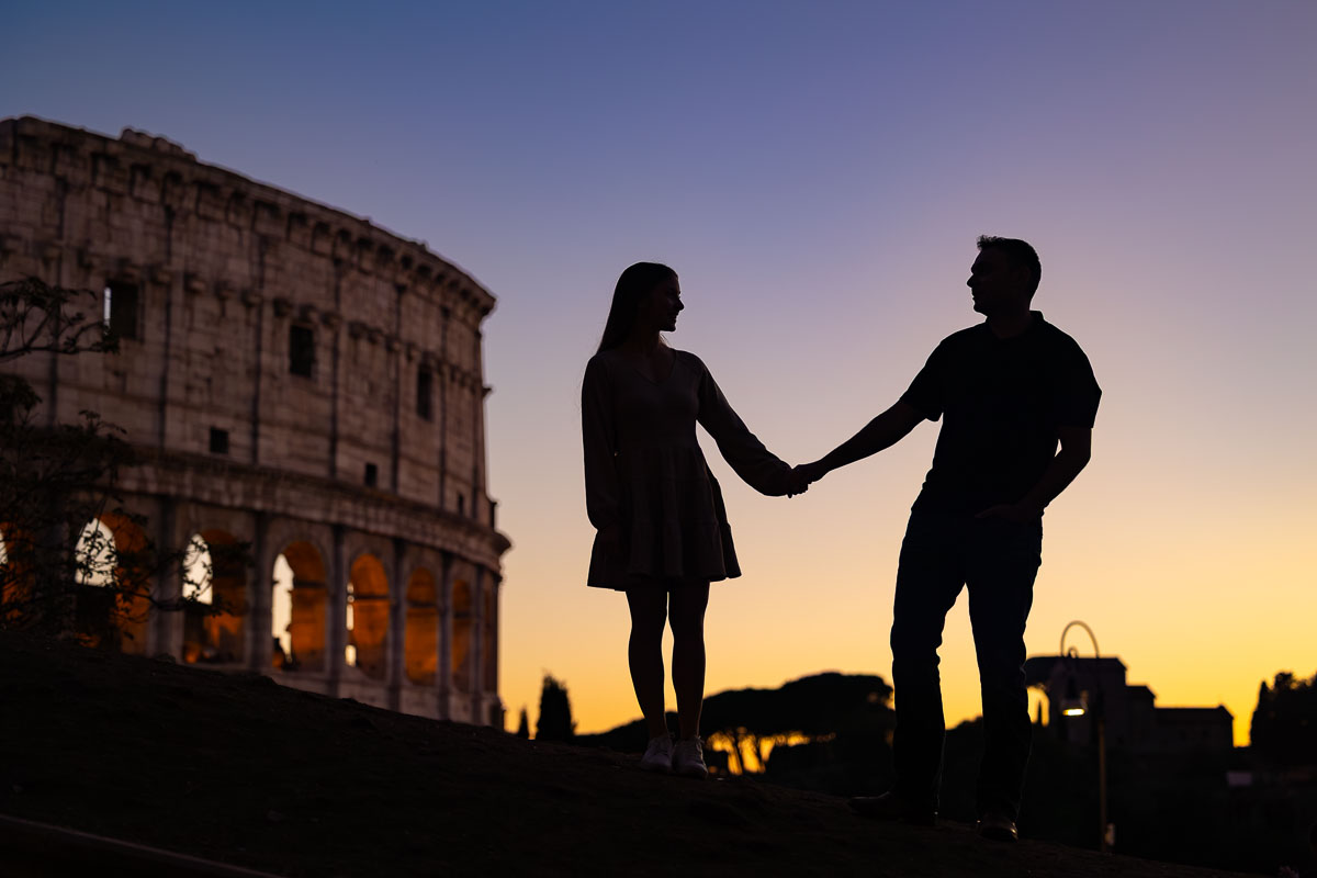 Silhouette photography of a newly engaged couple taking their engagement photos during a Rome photoshoot