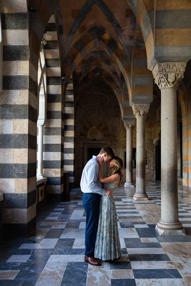 Photo session on top of the Duomo underneath the pillars with the typical architecture 
