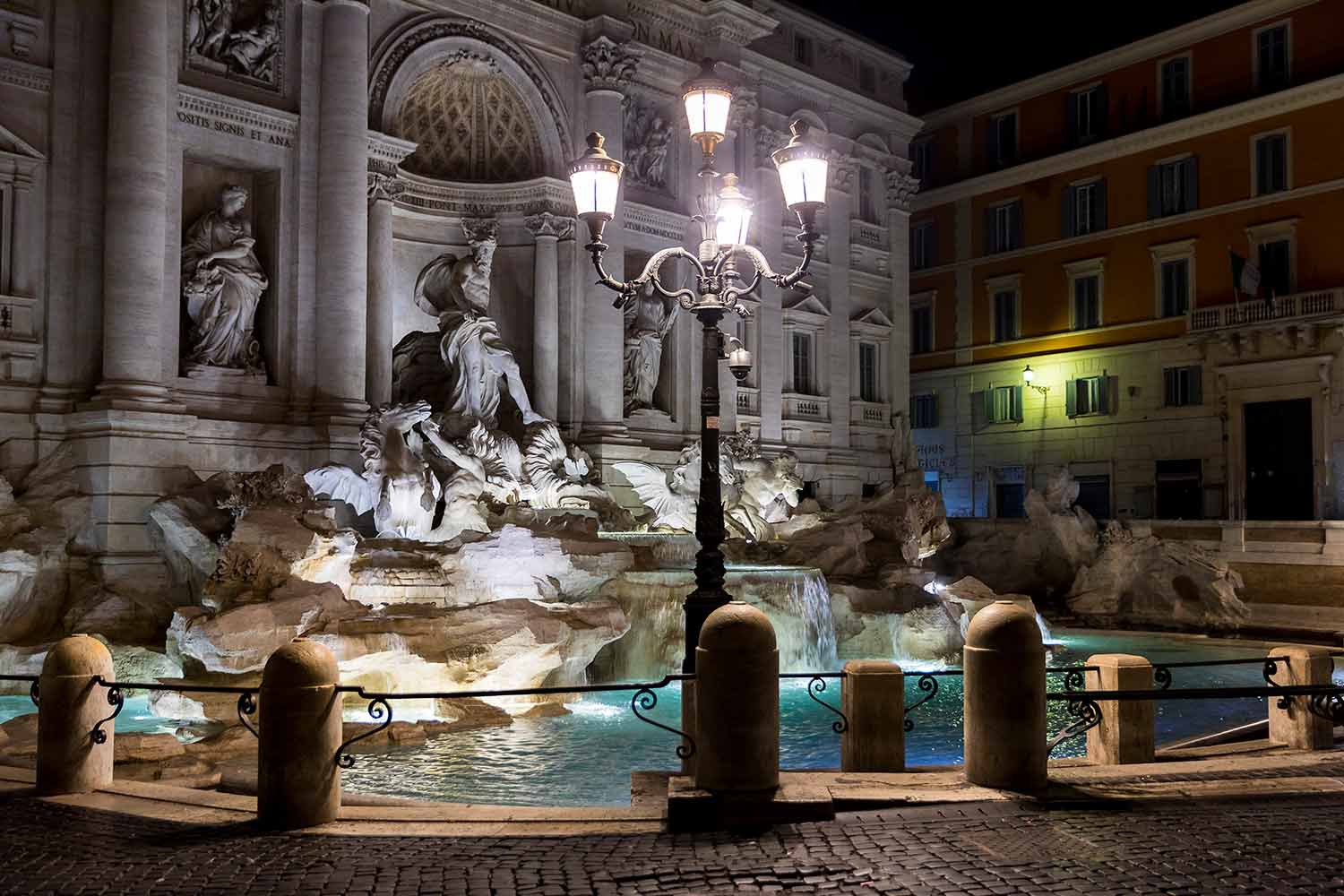 Trevi Fountain illuminated at night, ideal for planning a proposal in Rome