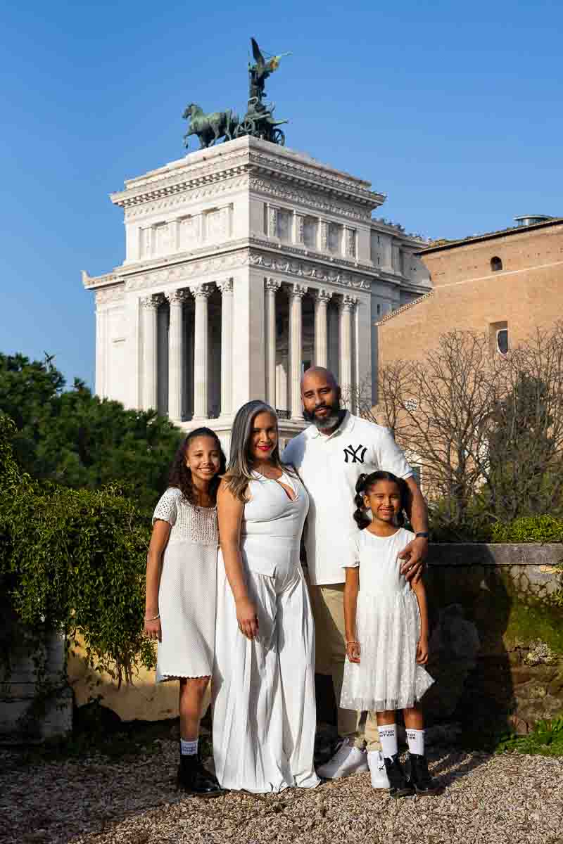 Portrait at Vittoriano monument in the background from Piazza del Campidoglio overlooking the Roman Forum skyline