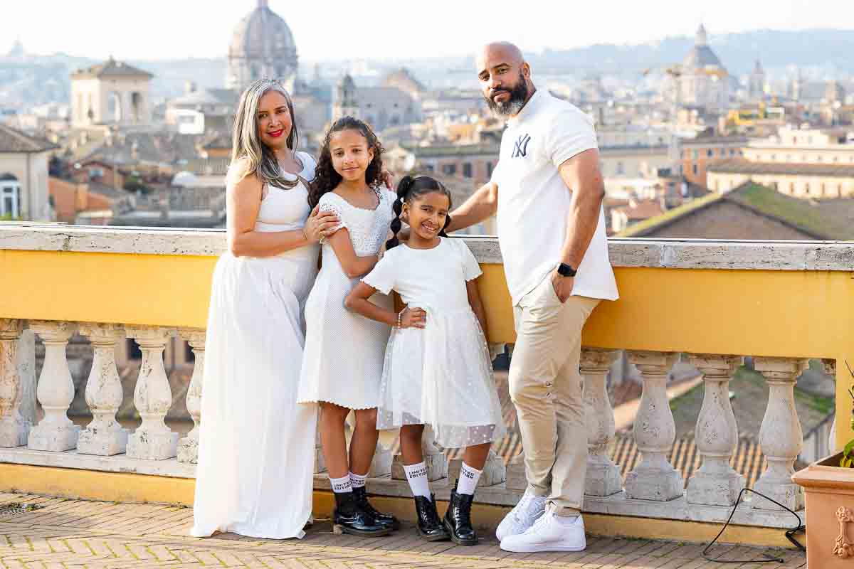 Photo session on Capitoline Hill with the Eternal City skyline and historic domes stretching across the background. Rome Family Portraits series