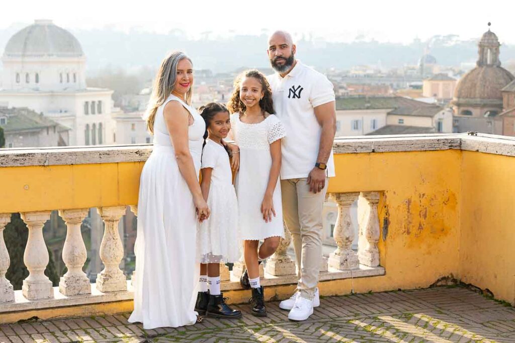 Photo taken from a terrace viewpoint with panoramic skyline views across the Eternal City