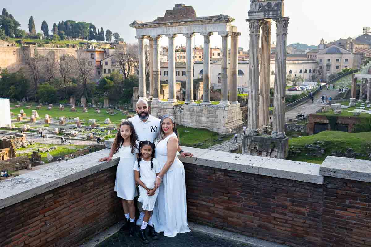 Photoshoot overlooking the Roman Forum from a terrace with sweeping skyline views
