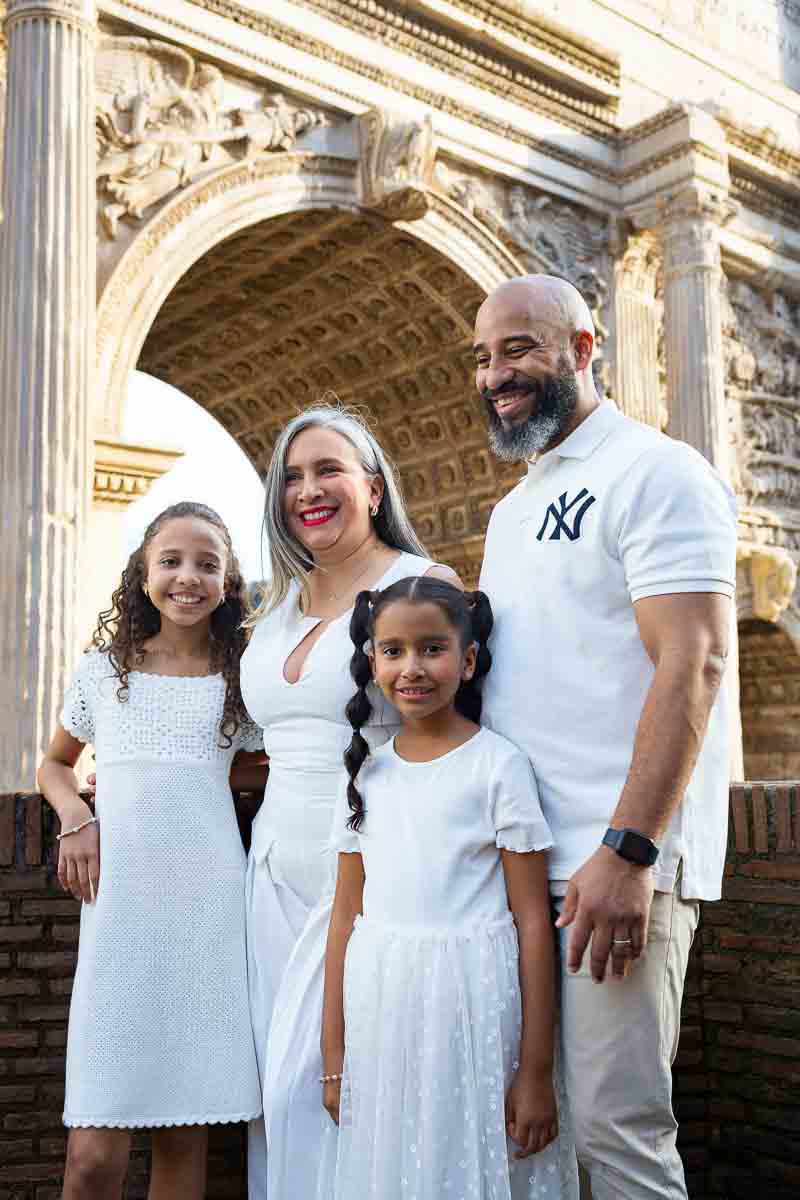 Photography session beside the Arch of Septimius Severus surrounded by historic Roman Forum columns