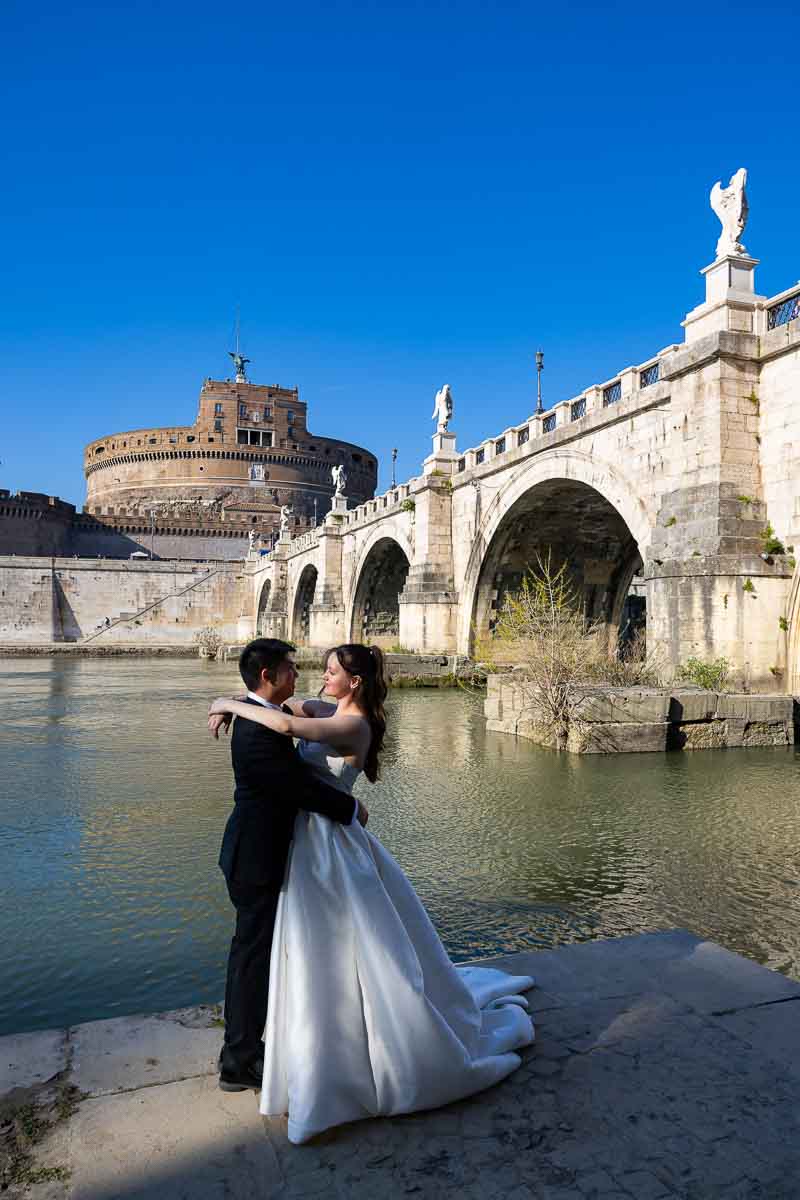 Final newlywed wedding pictures taken by iconic Castel Sant’Angelo.