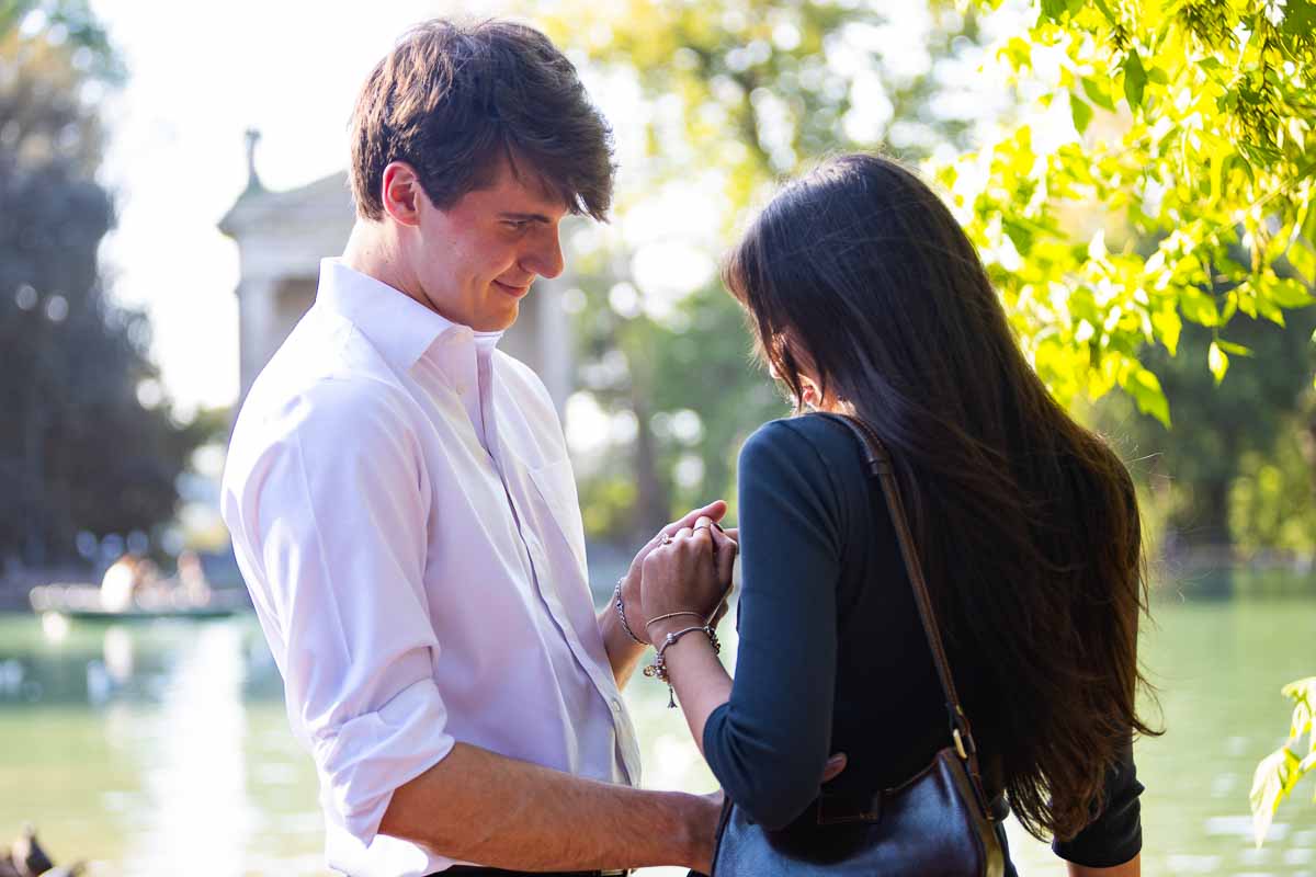 Just engaged looking at each other and the engagement ring 
