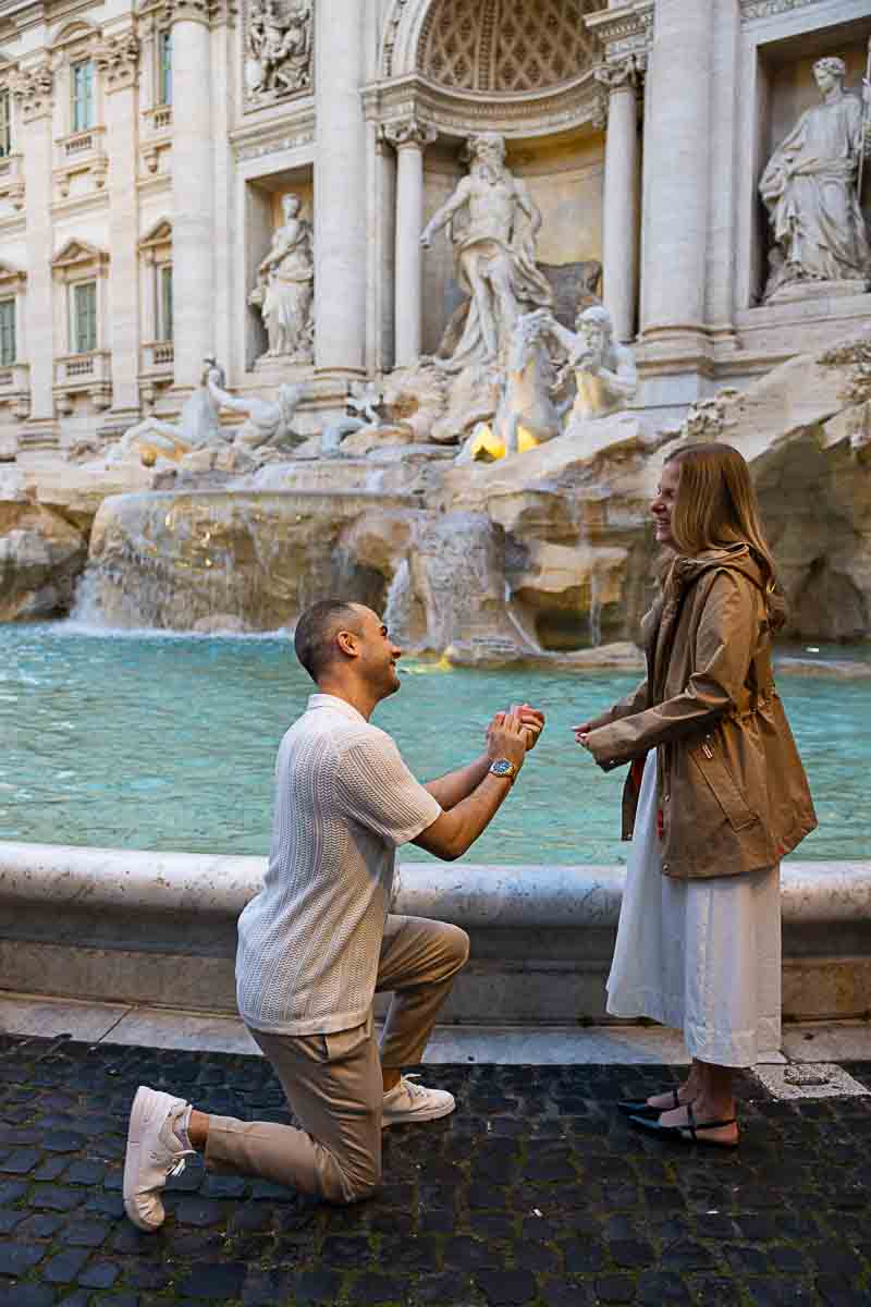 Knee-down wedding proposal at Trevi Fountain