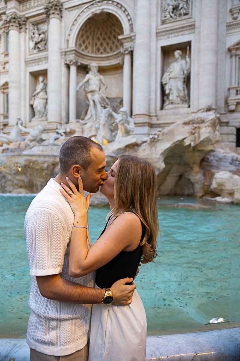 Engagement kiss in Rome, romantic moment
