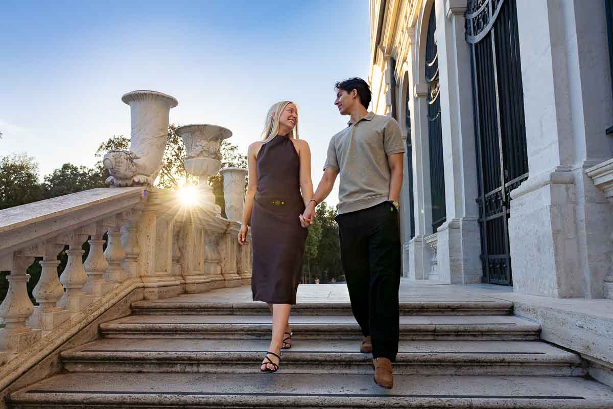 Lifestyle photography session while walking down the steps of the Galleria museum as the photographed shoots candid and spontaneous pictures