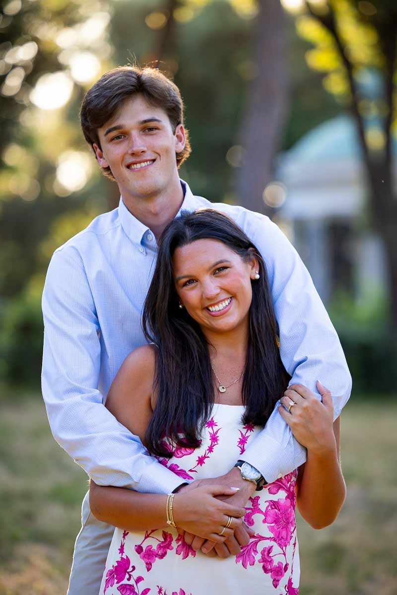 Classic portrait of a couple looking back at the camera and smiling 