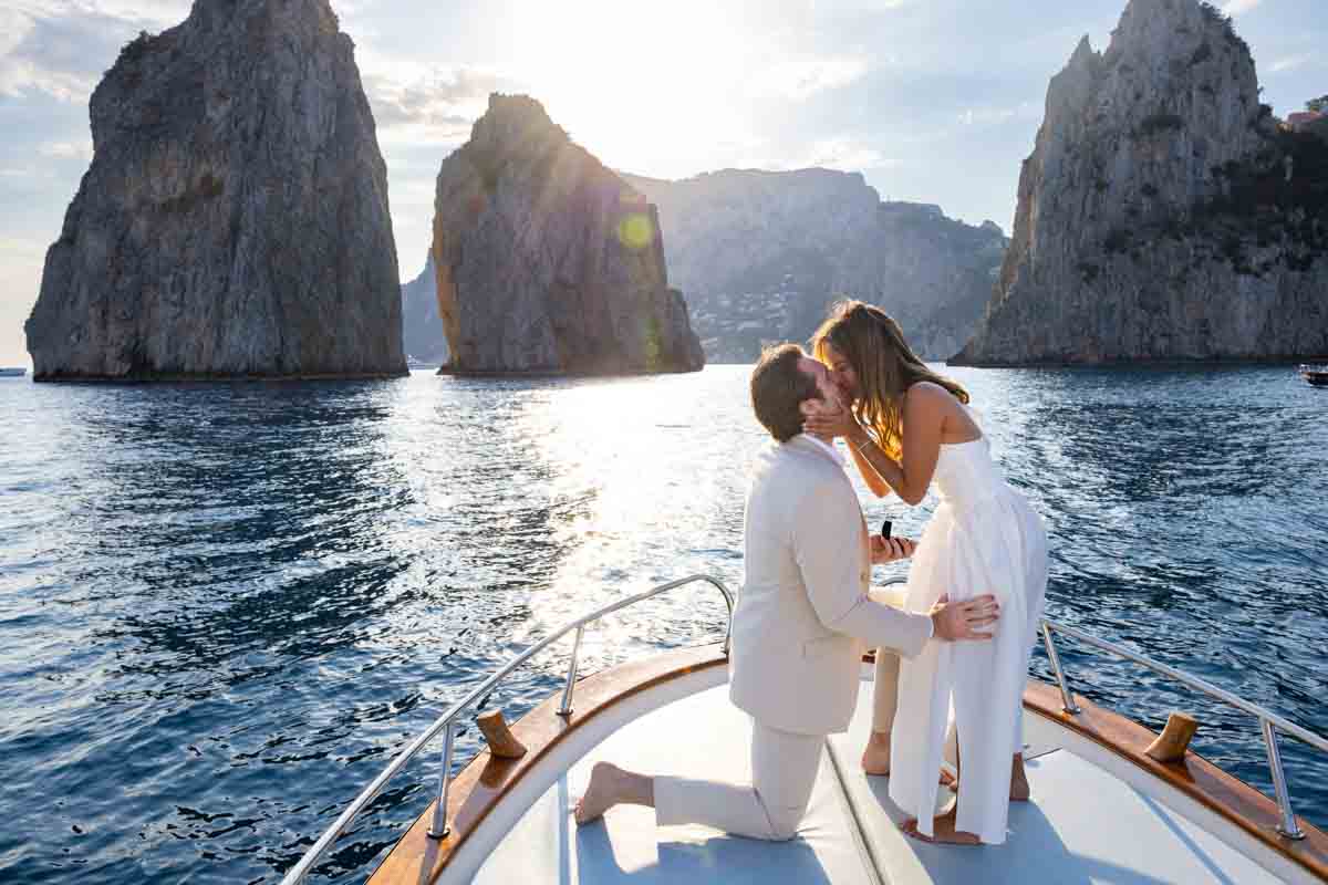 Kissing moment immortalized in professional photos during golden light prior to sunset 