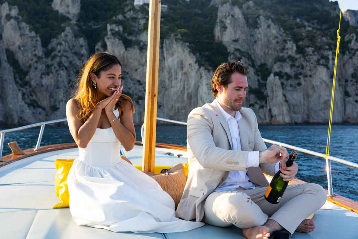 Starting the celebration with a bottle of champagne in anticipation 