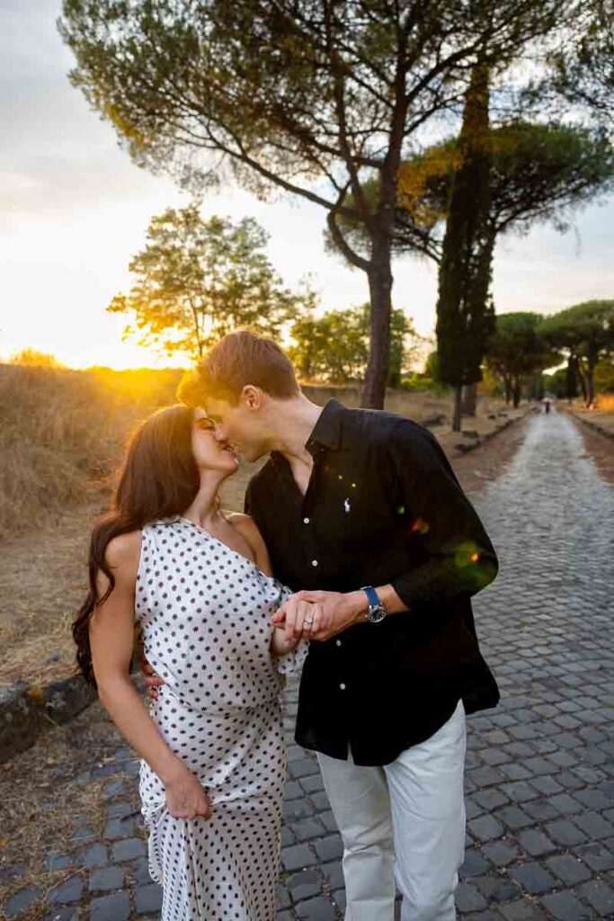 Final romantic kiss captured by Andrea Matone as the couple celebrates their new beginning beneath the fading evening light in Rome