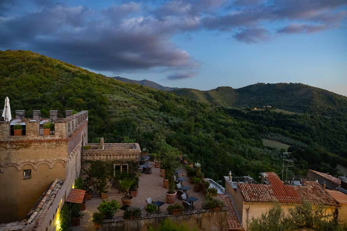 A breathtaking wide-angle view photography of Castello Brancaccio fading into the deep blue hour sky.