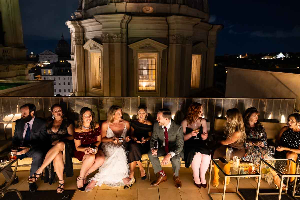 A wide-angle group picture capturing all the party guests enjoying the open-air venue.