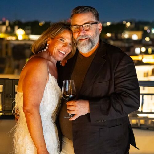 A final, elegant portrait of the bride and groom-to-be as the evening draws to a close.