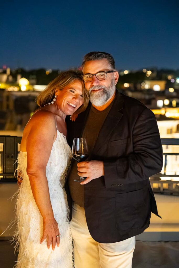 A final, elegant portrait of the bride and groom-to-be as the evening draws to a close.
