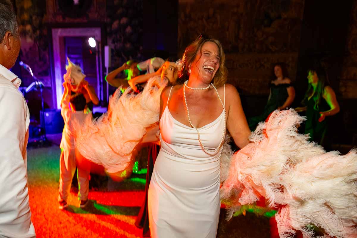 Lively dance floor interactions capturing the authentic spirit of a destination celebration.