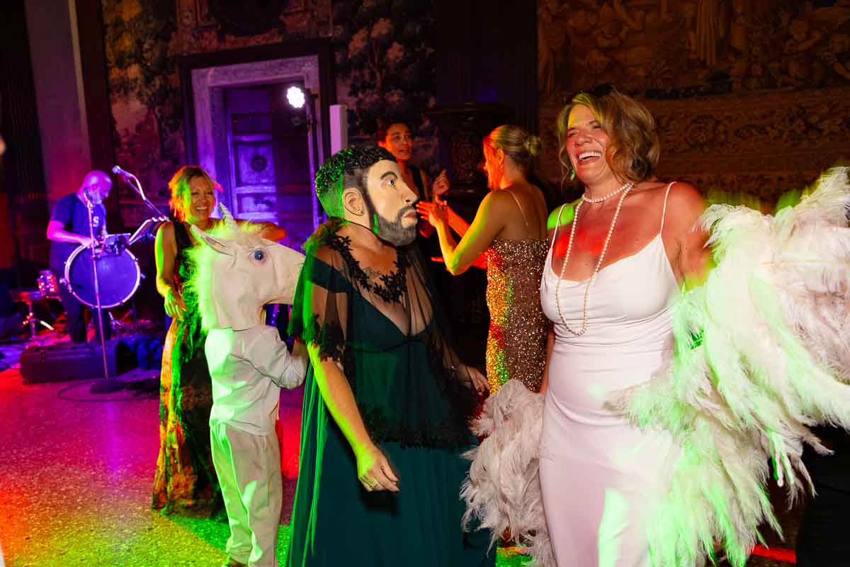 Guests using different type of masks for a laugh