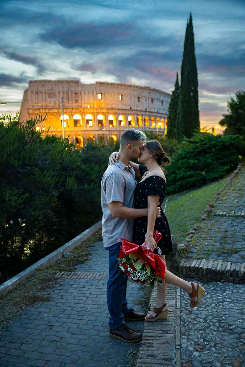 A tight, emotional embrace showcasing the natural chemistry between two people in love during nightfall while on a photo session
