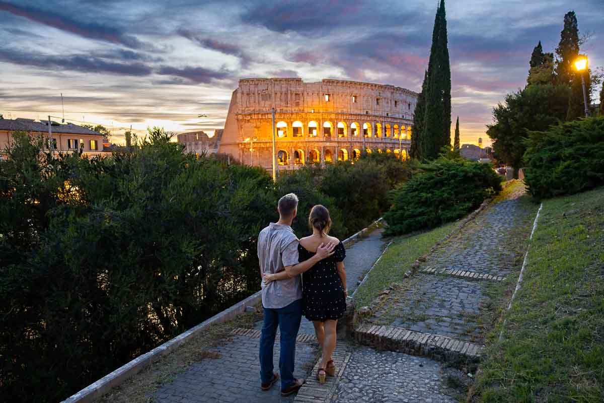 The future bride and groom admiring the panoramic view under a deep indigo sky as the monuments light up.